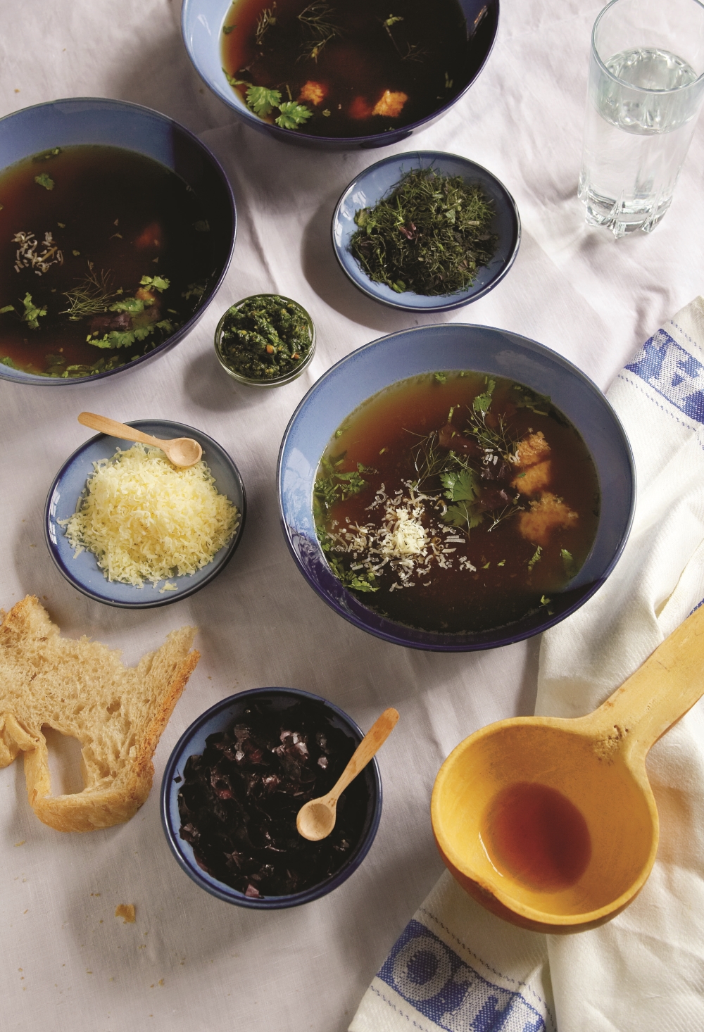 Broth served with herbs, cheese and bread from Gerry Galvin